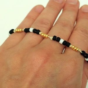 Black white and gold bracelet